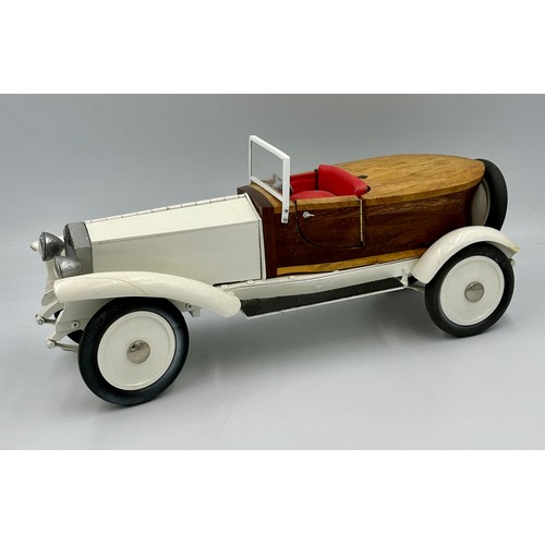 1288 - A scratch-built remote control model of a Rolls Royce with boat tail, fitted in a wood and glass cas... 