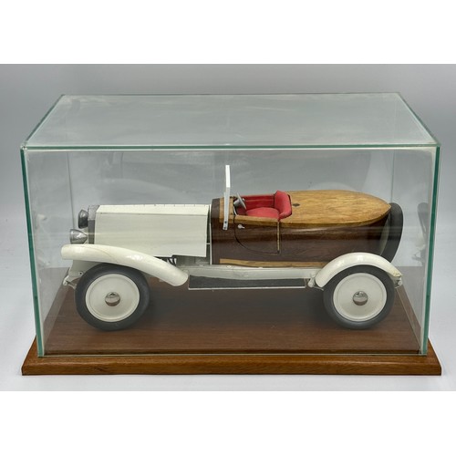 1288 - A scratch-built remote control model of a Rolls Royce with boat tail, fitted in a wood and glass cas... 