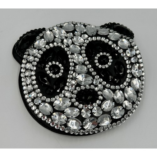 942 - A Butler & Wilson beaded Panda evening bag encrusted with faux jewels and with zip compartment to in... 