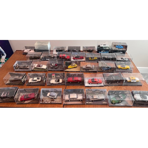 1078 - Collection of 38 James Bond toy cars by 'GE Fabbri'. All in original packaging with magazines and 2 ... 