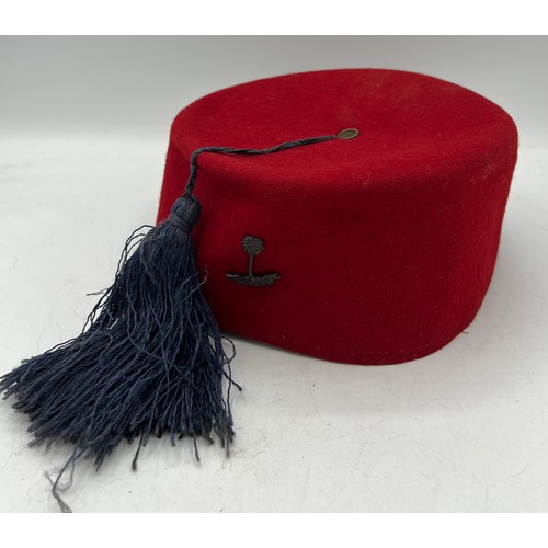 1204 - Royal West African Frontier Force Fez with tassel and badge.