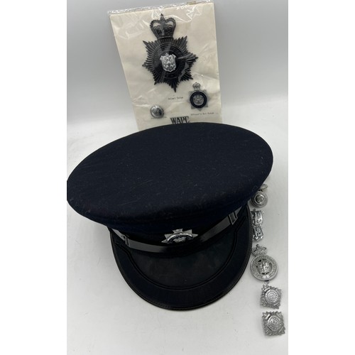 1205 - East Riding of Yorkshire Constabulary cap together with badges, buttons etc. Hat made by Christys of... 