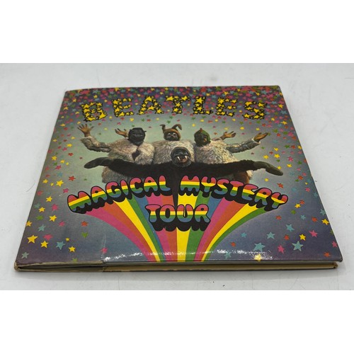 1222 - A 1967 Beatles Magical Mystery Tour 6 track mono double 7’’ EP. Integral blue lyric sheet booklet.