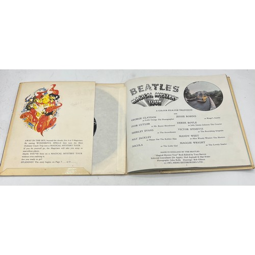 1222 - A 1967 Beatles Magical Mystery Tour 6 track mono double 7’’ EP. Integral blue lyric sheet booklet.