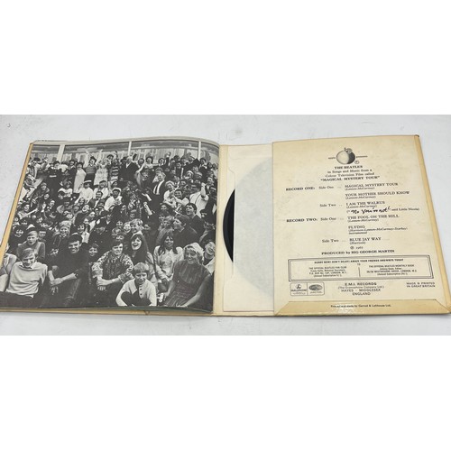 1222 - A 1967 Beatles Magical Mystery Tour 6 track mono double 7’’ EP. Integral blue lyric sheet booklet.