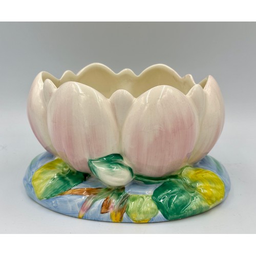 221 - A Clarice Cliff Newport Pottery pink waterlily bowl, with printed mark, length 22cm, together with a... 