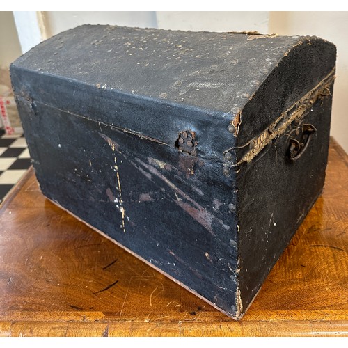 1281 - Local interest. A small wooden trunk with metal carrying handles and studs and label to interior for... 