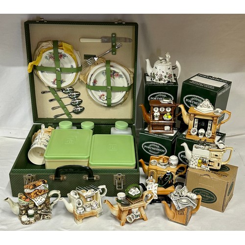 222 - Ten Portmeirion Pottery novelty teapots with boxes together with a Brexton green cased picnic set.