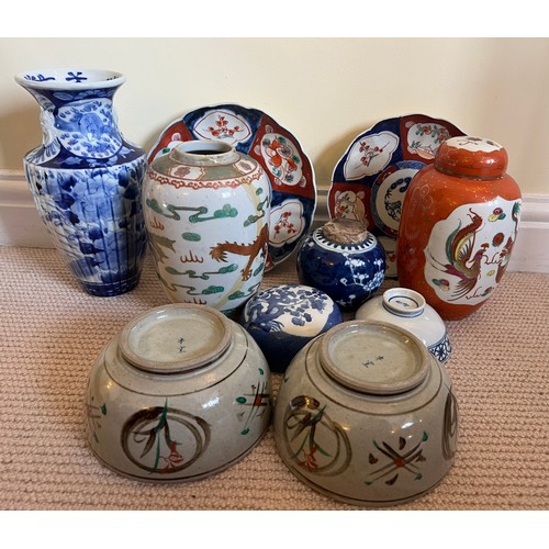 1163 - Oriental ceramics to include vases, ginger jars, bowls and Imari plates.