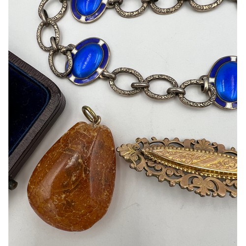 381 - Jewellery to include a Norwegian sterling silver and enamel necklace, brooches and amber pendant.