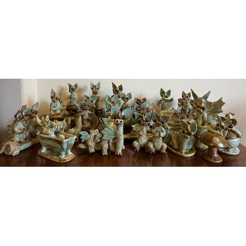 281 - A large quantity of Yare design pottery dragon figures. Many with paper labels. (39)