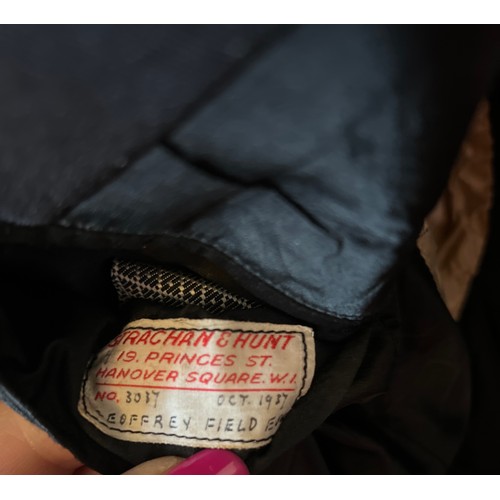 941 - A vintage gentleman’s tailcoat with interior label for Strachan & Hunt Oct. 1937 together with tie, ... 