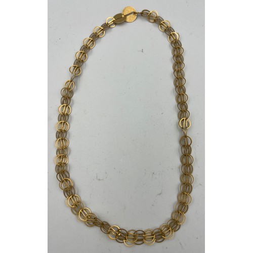 392 - An 18 carat gold necklace 11.6gm. Length 44cm.