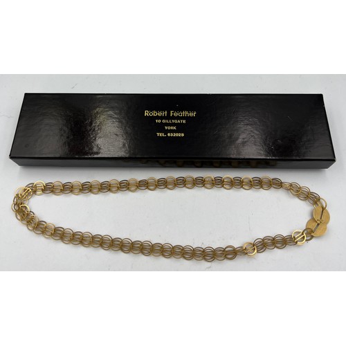 392 - An 18 carat gold necklace 11.6gm. Length 44cm.