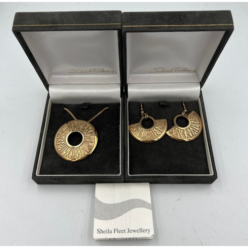 393 - Sheila Fleet of Orkney 9 carat gold matching pendant 40cm chain and earrings, 28.6gm.