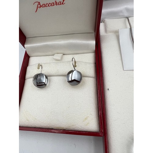 395 - Baccarat Tentation pendant and earrings in original boxes both set in silver.