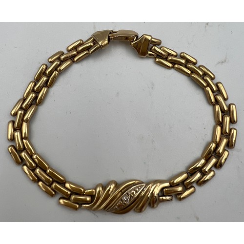 396 - A 9 carat yellow gold bracelet set with single diamond. 19cm length. 7.8gm.