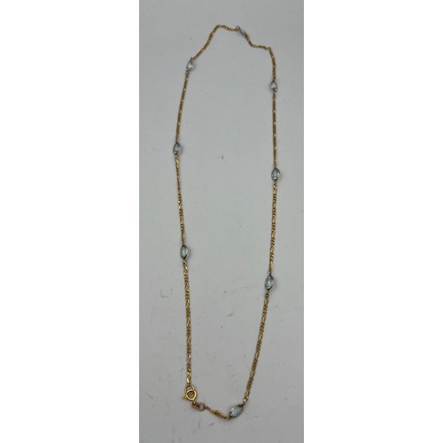 400 - A 9 carat gold chain necklace set with pale blue stones. Length 62cm. Weight 7.3gm