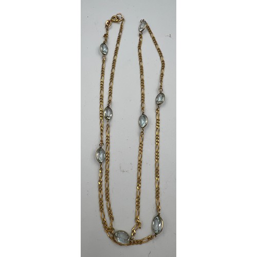 400 - A 9 carat gold chain necklace set with pale blue stones. Length 62cm. Weight 7.3gm