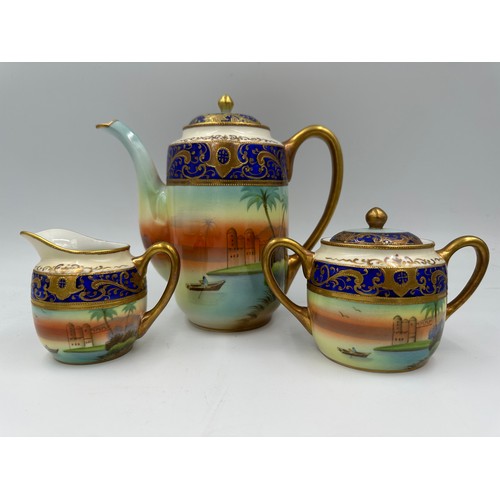 227 - A Meito hand painted Noritake style fifteen piece coffee set complete with coffee pot, two handled s... 