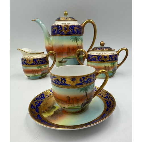 227 - A Meito hand painted Noritake style fifteen piece coffee set complete with coffee pot, two handled s... 