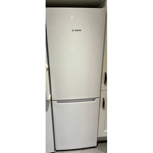 1249 - A Bosch fridge/freezer 59cm w x 176cm h.