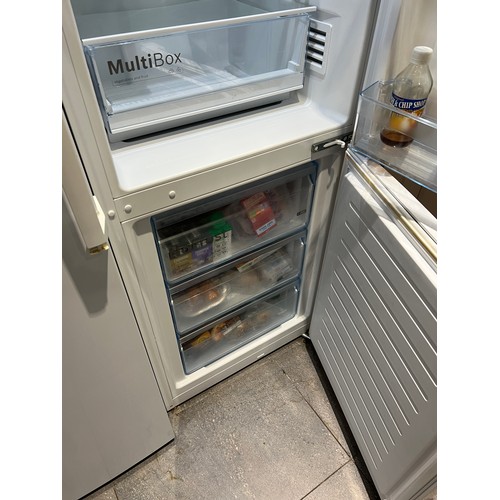 1249 - A Bosch fridge/freezer 59cm w x 176cm h.