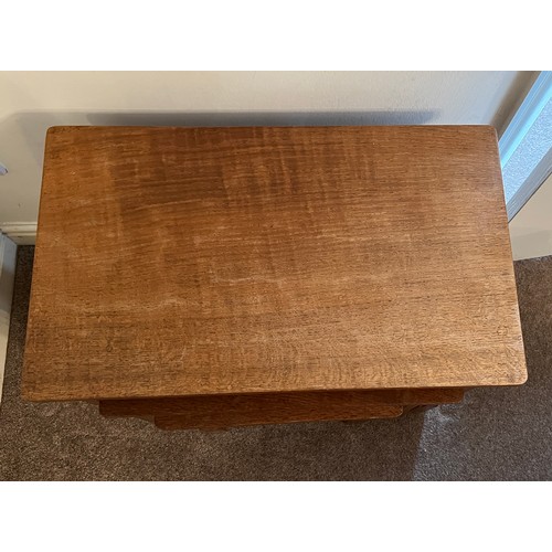 98 - A Rabbitman Peter Heap oak nest of three tables with adzed top. Largest 61cm w x 36cm d x 51cm h.