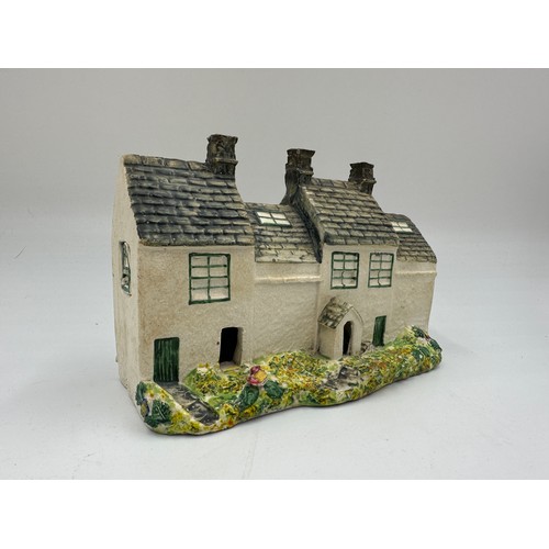 273 - A 19thC ceramic model of White Wells Ilkley Moor.  20cm w x 8cm d x 13.5cm h.