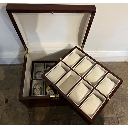 1173 - A good quality watch box with two interior display trays. 28cm x 24cm x 17cm.