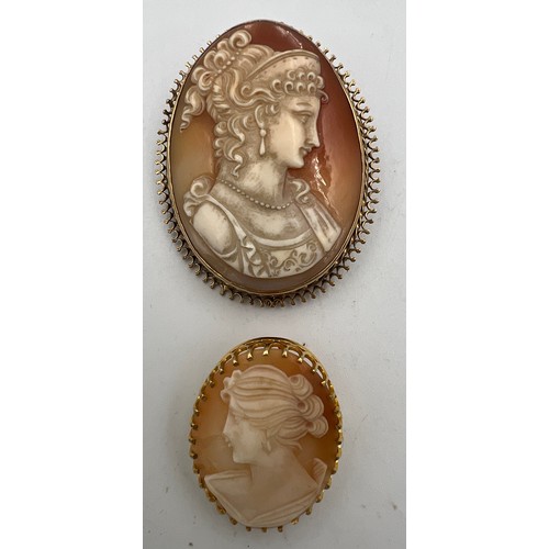 373 - Two 9 carat gold mounted carved shell cameo brooches. Larger one 5cm x 4cm.