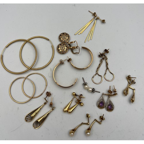 418 - Twelve pairs of pierced earrings mainly 9 carat gold, others unmarked yellow metal, to include cultu... 