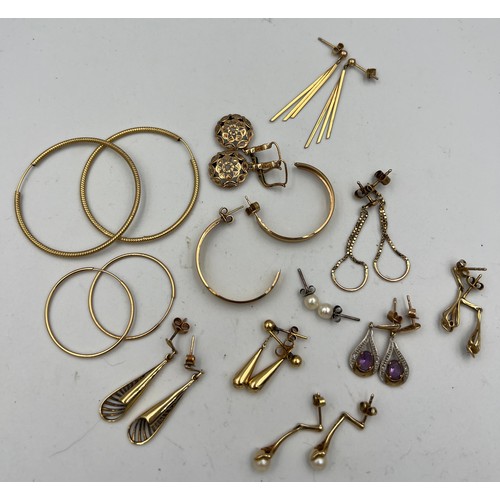 418 - Twelve pairs of pierced earrings mainly 9 carat gold, others unmarked yellow metal, to include cultu... 