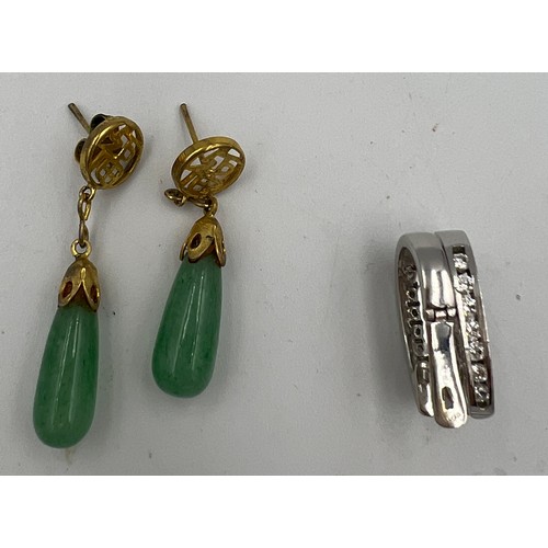 419 - Two pairs of earrings to include 9 carat white gold set with clear stones and unmarked yellow metal ... 