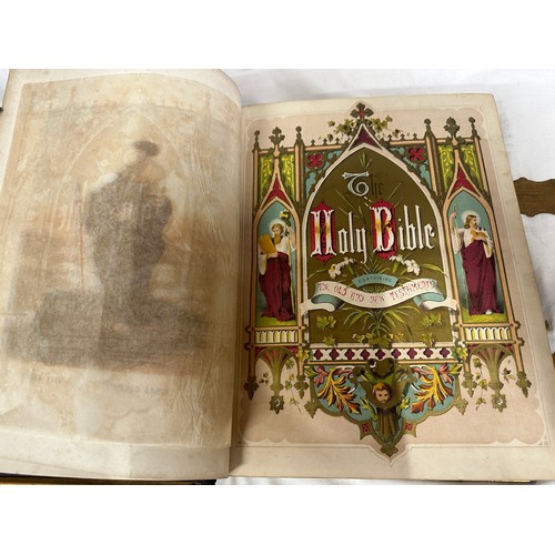 1054 - A pair of large leather bound illustrated Holy Bibles, both   'Brown's Self-Interpreting Family Bibl... 