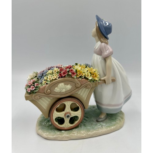 231 - A Lladro “Love’s Tender Tokens” figurine, marks to base & impressed number 6521, height 22.5cm h 23c... 