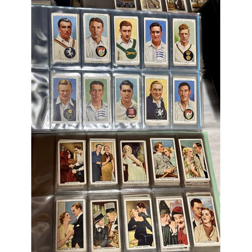 665 - A quantity of 6 albums of cigarette cards to include various topics, Football, Birds, Sportsmen, Cha... 