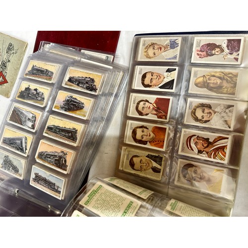 665 - A quantity of 6 albums of cigarette cards to include various topics, Football, Birds, Sportsmen, Cha... 