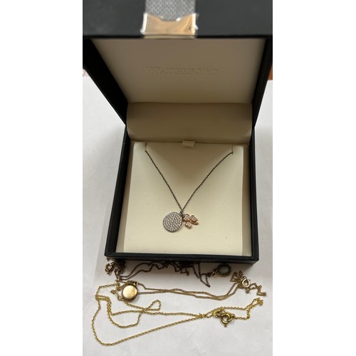 362 - A Waterford silver necklace and three rolled gold pendants.