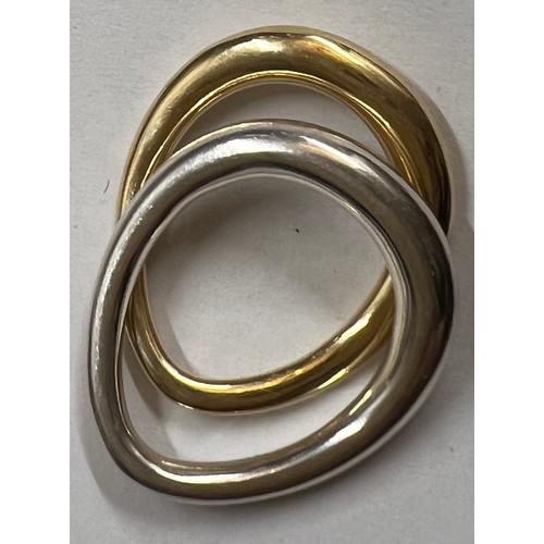 364 - Two Georg Jensen rings from the Offspring collection, one 18 carat gold 4.2gm and one silver. Approx... 