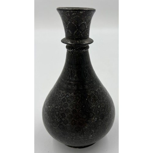 1165 - A 19thC Persian bronze and silver vase. 19cm h.