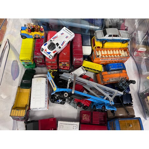 1119 - A large collection of mostly unboxed diecast vehicles to include a box of Corgi (majority buses), a ... 