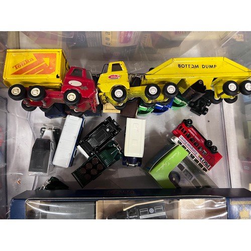 1119 - A large collection of mostly unboxed diecast vehicles to include a box of Corgi (majority buses), a ... 