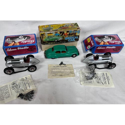 1112 - Two boxed Schuco 1060 Studio Mercedes Grand Prix 1936 tinplate clockwork models with keys & accessor... 