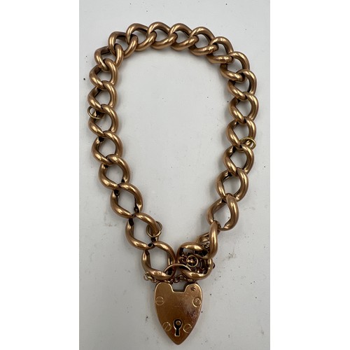 384 - A nine carat gold chain bracelet with heart shaped padlock clasp. Weight 16.3gm.