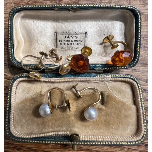 388 - Three pairs of vintage screw on earring to include pearl and diamond set, contained within a vintage... 