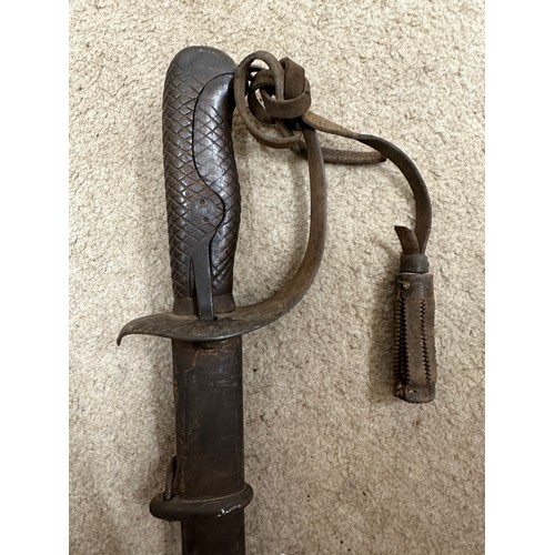 1203 - A Japanese model 1899 type 32 military sword and scabbard. Blade 30.5 inches. Numbered 8759 to top o... 