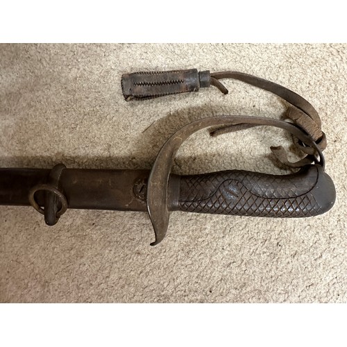 1203 - A Japanese model 1899 type 32 military sword and scabbard. Blade 30.5 inches. Numbered 8759 to top o... 