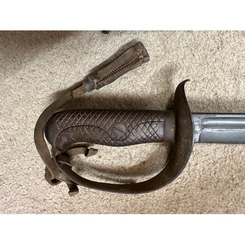 1203 - A Japanese model 1899 type 32 military sword and scabbard. Blade 30.5 inches. Numbered 8759 to top o... 