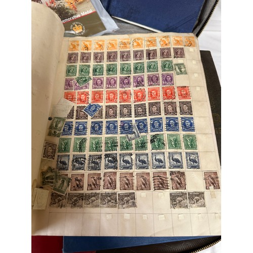 673 - A suitcase containing a large accumulation of world stamps mounted on pages in drawing book and 7 fi... 